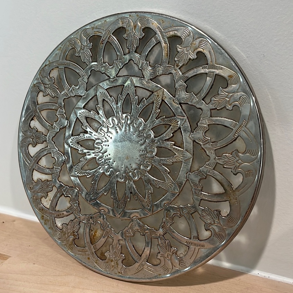 Vintage silver over glass trivet.